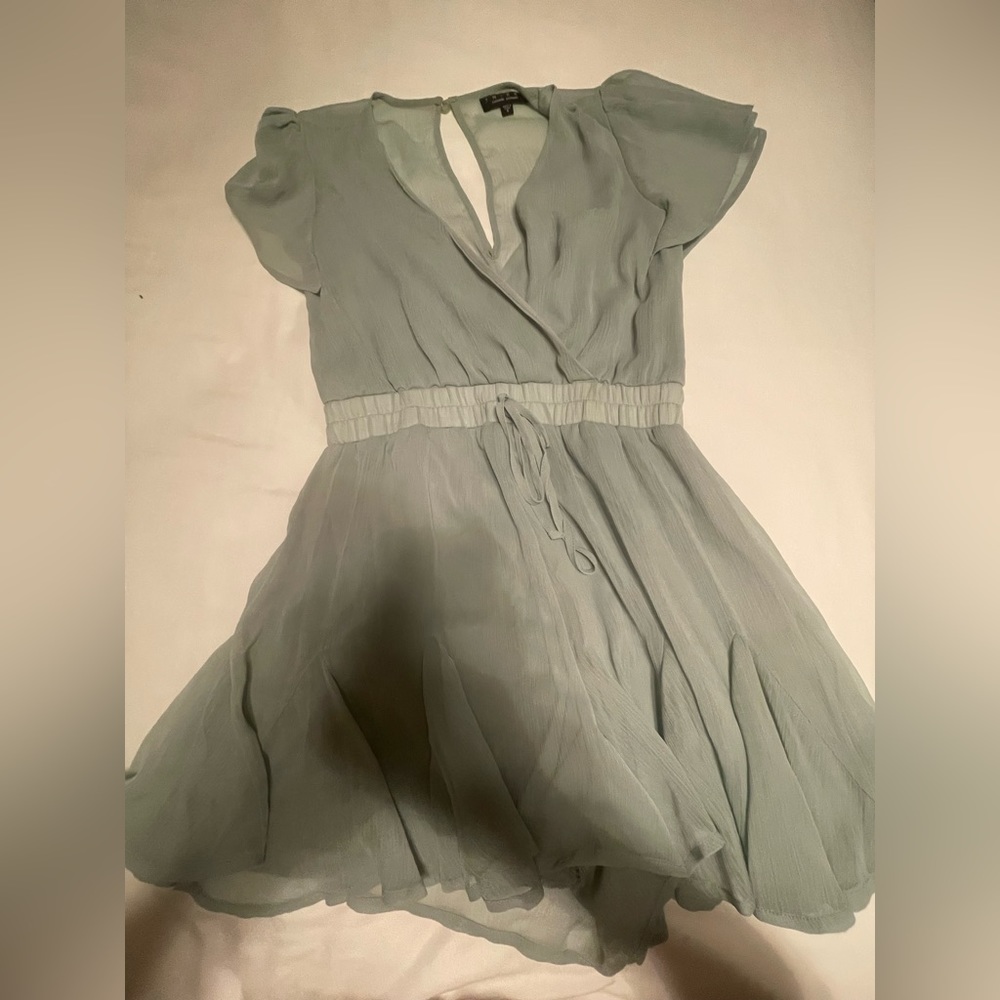 Francesca’s Light Teal Quinn Ruffle Romper